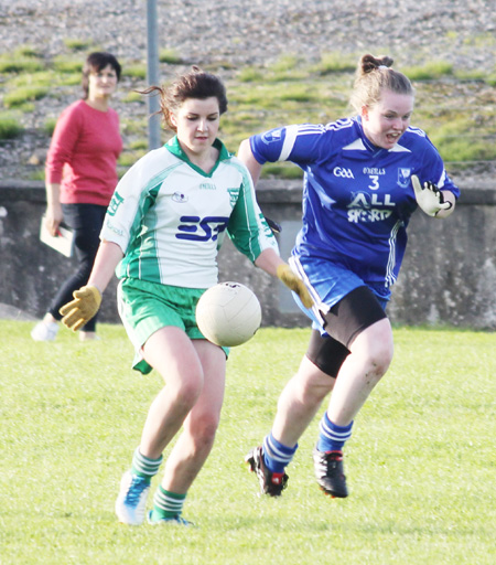 Action from the ladies under 16 match between Aodh Ruadh and Four Masters.