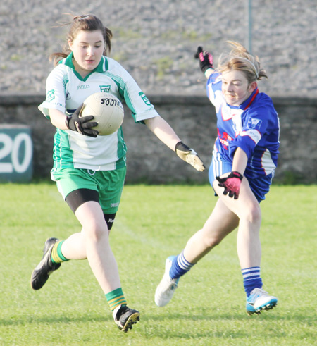 Action from the ladies under 16 match between Aodh Ruadh and Four Masters.