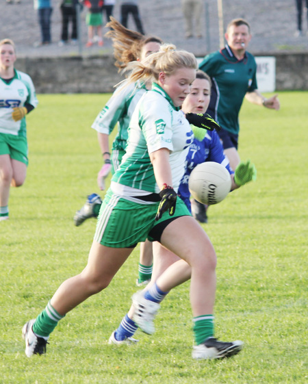 Action from the ladies under 16 match between Aodh Ruadh and Four Masters.