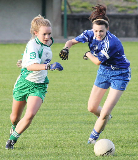 Action from the ladies under 16 match between Aodh Ruadh and Four Masters.