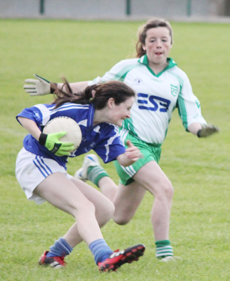 Action from the ladies under 16 match between Aodh Ruadh and Four Masters.