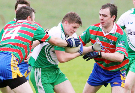 Action from the division three senior reserve football league match against Burt.