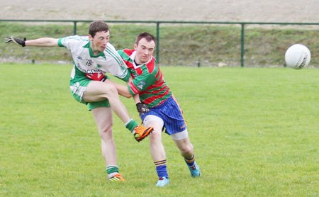 Action from the division three senior reserve football league match against Burt.