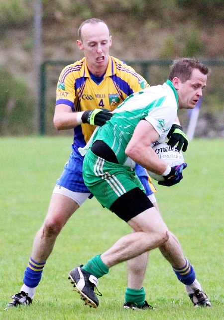 Action from the division three senior football league match against Burt.