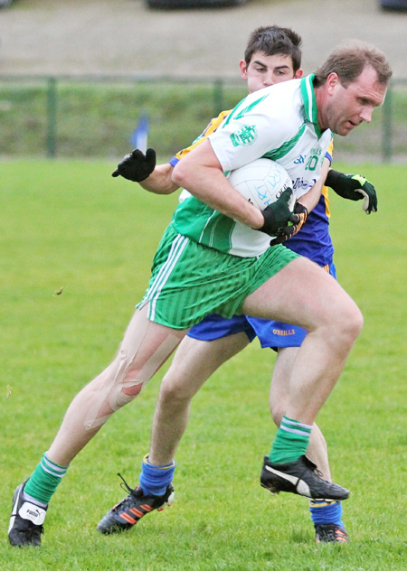 Action from the division three senior football league match against Burt.