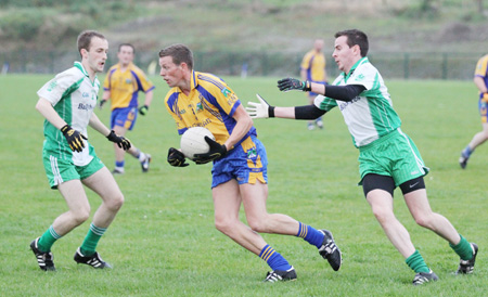 Action from the division three senior football league match against Burt.