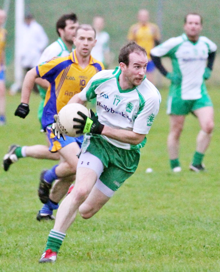 Action from the division three senior football league match against Burt.