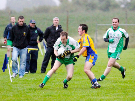 Action from the division three senior football league match against Burt.