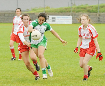 Action from the ladies senior match between Aodh Ruadh and Glenfin.