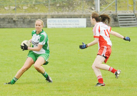 Action from the ladies senior match between Aodh Ruadh and Glenfin.