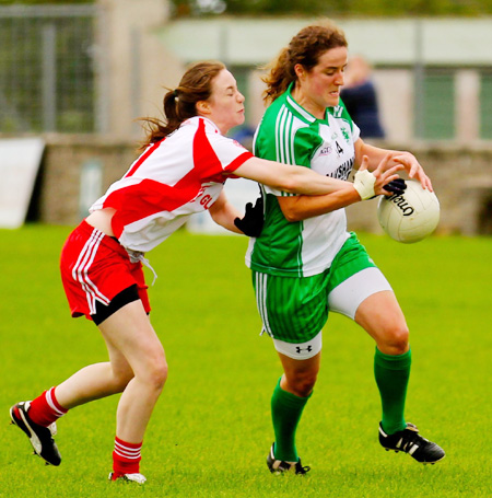 Action from the ladies senior match between Aodh Ruadh and Glenfin.