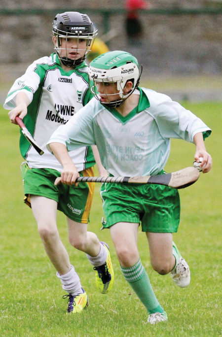 Action from the under 12 hurling game between Aodh Ruadh and MacCumhaill's.