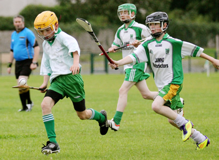 Action from the under 12 hurling game between Aodh Ruadh and MacCumhaill's.