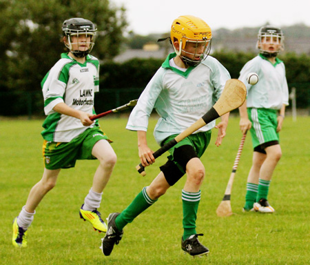 Action from the under 12 hurling game between Aodh Ruadh and MacCumhaill's.