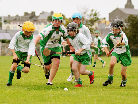 Action from the under 12 hurling game between Aodh Ruadh and MacCumhaill's.