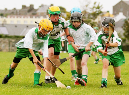 Action from the under 12 hurling game between Aodh Ruadh and MacCumhaill's.