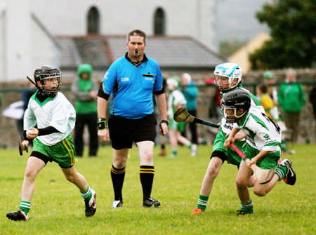 Action from the under 12 hurling game between Aodh Ruadh and MacCumhaill's.