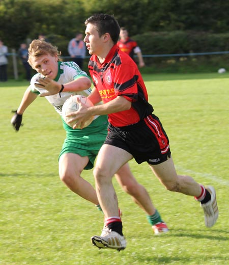 Action from the division three senior reserve football league match against Urris.