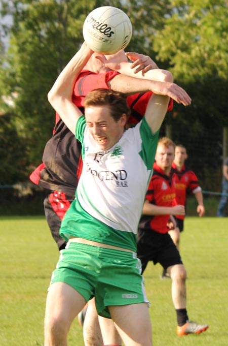 Action from the division three senior reserve football league match against Urris.