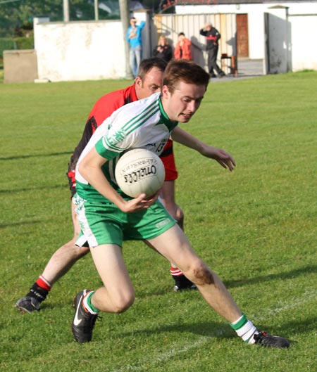 Action from the division three senior reserve football league match against Urris.