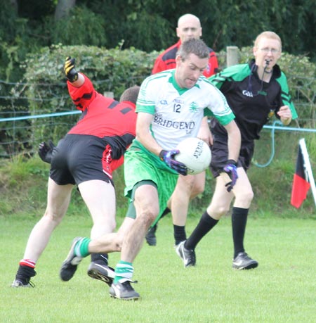 Action from the division three senior reserve football league match against Urris.