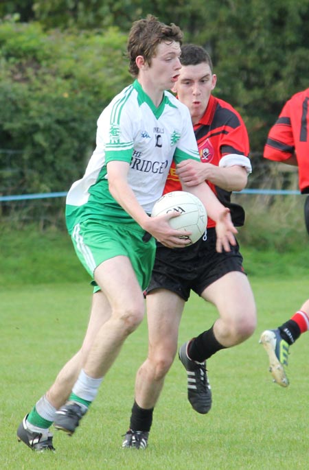 Action from the division three senior reserve football league match against Urris.