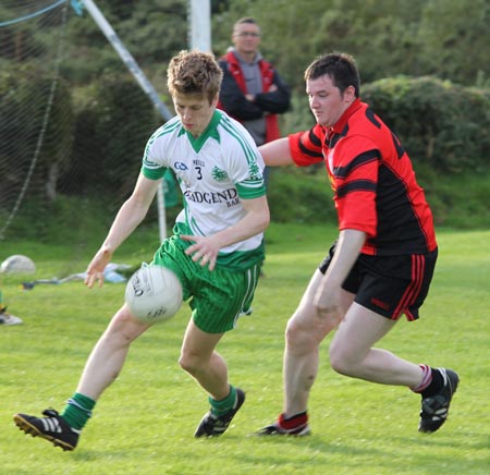 Action from the division three senior reserve football league match against Urris.