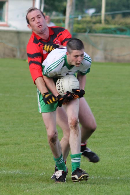 Action from the division three senior reserve football league match against Urris.