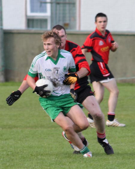 Action from the division three senior reserve football league match against Urris.