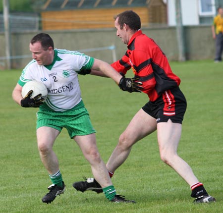 Action from the division three senior reserve football league match against Urris.