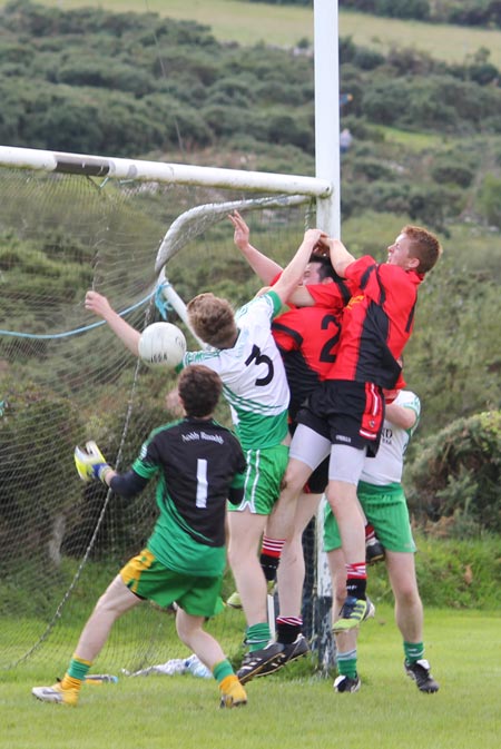 Action from the division three senior reserve football league match against Urris.