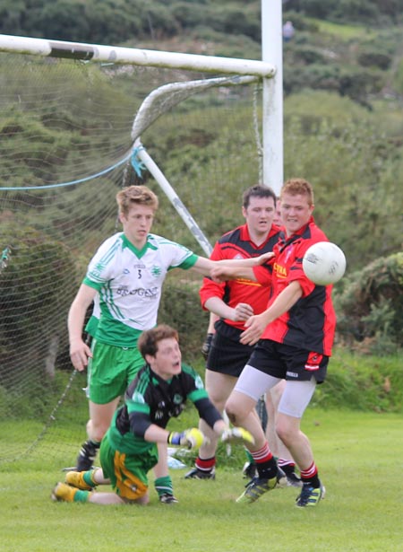 Action from the division three senior reserve football league match against Urris.