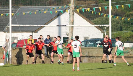 Action from the division three senior reserve football league match against Urris.