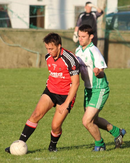 Action from the division three senior reserve football league match against Urris.