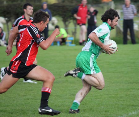 Action from the division three senior reserve football league match against Urris.