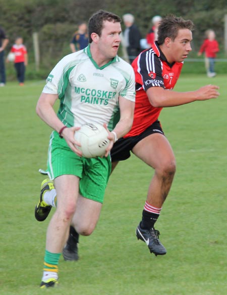 Action from the division three senior reserve football league match against Urris.