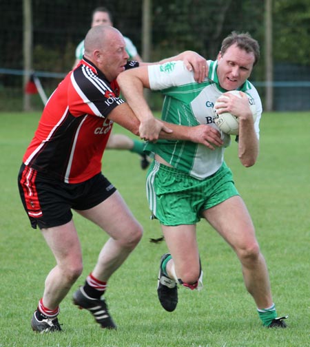 Action from the division three senior reserve football league match against Urris.