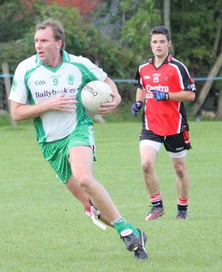 Action from the division three senior reserve football league match against Urris.