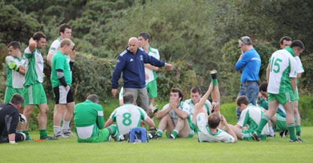 Action from the division three senior reserve football league match against Urris.