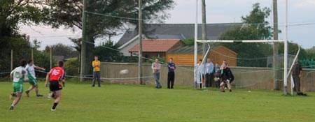 Action from the division three senior reserve football league match against Urris.