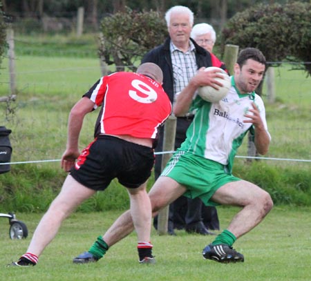 Action from the division three senior reserve football league match against Urris.