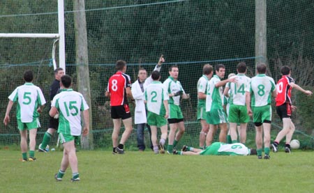 Action from the division three senior reserve football league match against Urris.