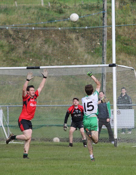Action from the intermediate reserve football championship game against Naomh Bríd.