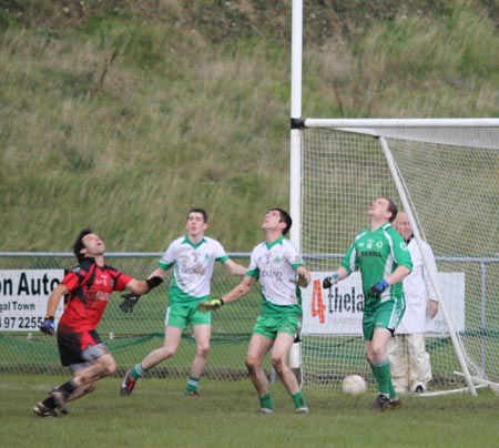 Action from the intermediate reserve football championship game against Naomh Bríd.