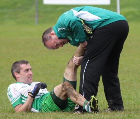 Action from the intermediate reserve football championship game against Naomh Bríd.