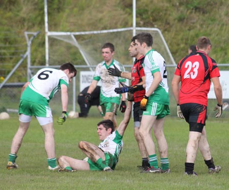 Action from the intermediate reserve football championship game against Naomh Bríd.