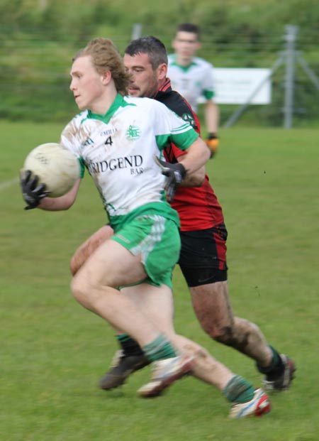 Action from the intermediate reserve football championship game against Naomh Bríd.