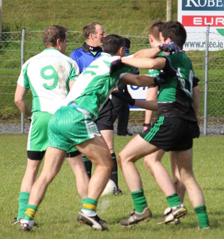 Action from the intermediate football championship match against Naomh Bríd.