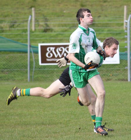 Action from the intermediate football championship match against Naomh Bríd.