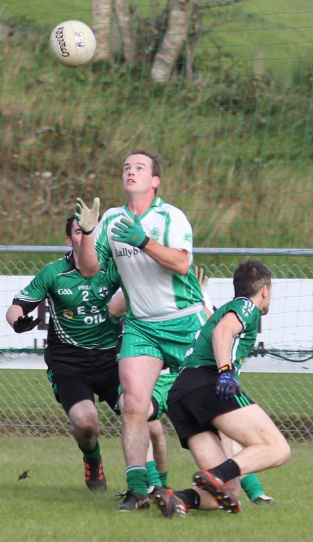 Action from the intermediate football championship match against Naomh Bríd.